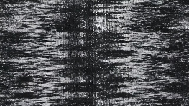 Dynamic motion of rapidly shifting, fragmented black and white vertical lines creating a chaotic technological static noise abstract texture background loop, chaotic, visualization