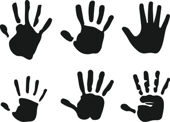 Fototapeta premium A collection of black handprints arranged on a plain white background