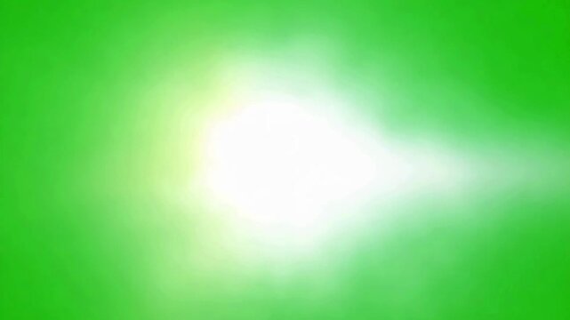 White energy projectile or comet flying horizontally on green screen for sci-fi weapons and magic attacks.