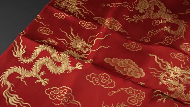 Luxurious Red Silk Fabric with Golden Dragon Motifs.