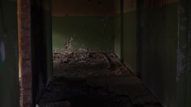 dark corridor with timber pile and debris, collapsed floor and scattered bricks, dim ambient light from doorway, gritty texture, abandoned industrial decay, ominous silence