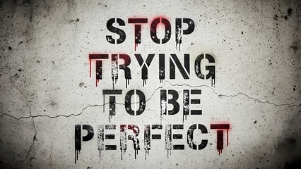 Motivational Quote Against Perfectionism on Grungy Wall