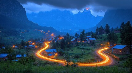 Valley village road, lights & mountains at twilight