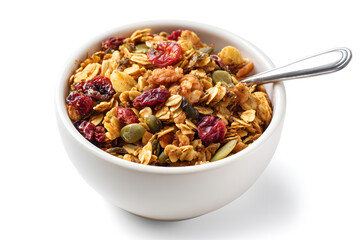 Healthy granola bowl with nuts and dried fruits placed on a white background at a breakfast setting