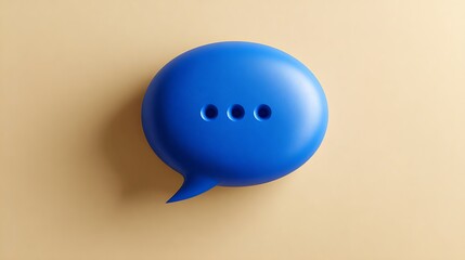 Blue chat bubble with minimalistic design on soft beige background, symbolizing communication and digital messaging.