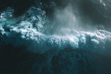 Powerful ocean wave crests and crashes, creating white foam and spray