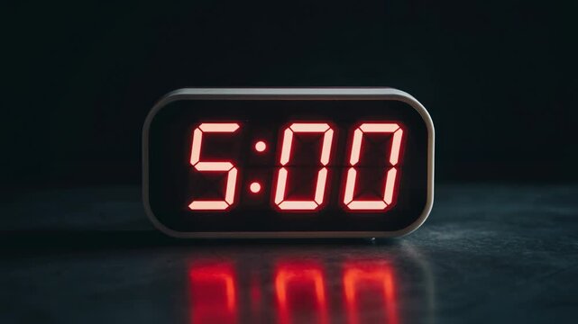 Digital clock displaying 5:00 AM, perfect for time management and morning routines