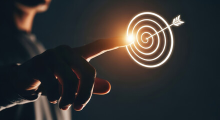 Achieving Goals A Focused Hand Points to a Glowing Target with Arrow Hitting Bullseye Symbolizing Success Precision and Strategic Aim in Business and Life