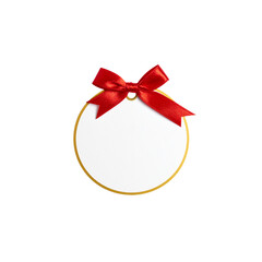 An empty tag adorns a gift box tied with a dark red ribbon and bow on a white background