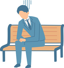 ベンチで落ち込むビジネスマン