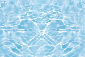 Blue water with ripples on the surface. Defocus blurred transparent blue colored clear calm water surface texture with splashes and bubbles. Water waves with shining pattern texture background.