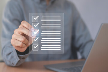 Digital document checklist on screen; productivity concepts and business technology; document integrity management.