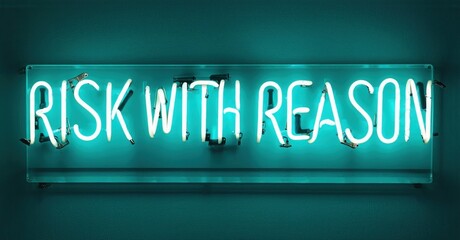 Fototapeta premium Bright neon sign displays text Risk With Reason. Turquoise glow contrasts dark background. Minimalist aesthetic, motivational message.