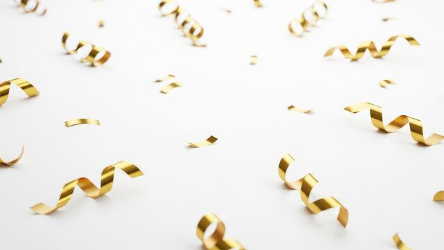 Gold streamer is falling on a white background