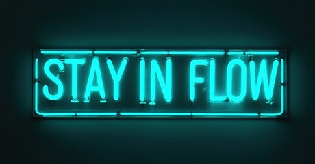 Fototapeta premium Bright neon sign displays text Stay In Flow. Dark background emphasizes glowing turquoise illumination. Minimalist design, modern aesthetic.