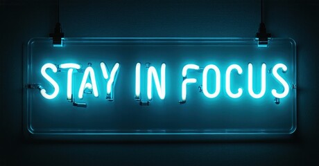 Fototapeta premium Bright neon sign displays motivational phrase. Blue light emanates from lettering, suspended against dark backdrop. Simple, direct message.