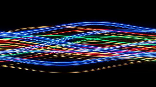 Abstract glowing neon blurred multicolour light streak rays on black background Glowing neon horizon