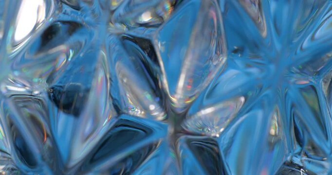 Blue Glass Refraction. Macro abstract of deep cobalt blue crystal glass with flowing light refractions and highlights.
