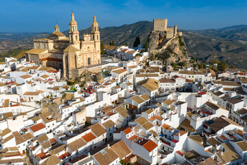 Majestic Olvera: 4K Cinematic Aerial Flyover of the Historic Moorish Castle, Neoclassical Church, and Whitewashed Streets of Andalusia’s Capital of Rural Tourism, Spain © Mike Workman