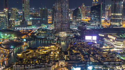 Fototapeta premium Dubai Downtown day to night timelapse view from the top in Dubai, United Arab Emirates