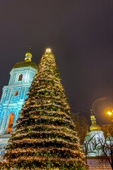 A festive Christmas tree lights up Saint Sophia Square, creating a joyful holiday atmosphere in the historic heart of Kyiv, Ukraine.