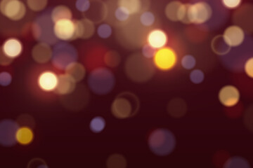 Abstract colorful bokeh lights background with glowing particles.