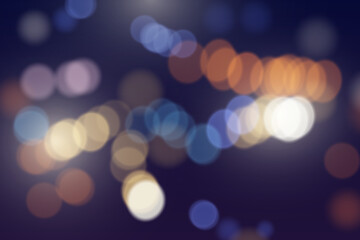 Fototapeta premium Defocused city lights with vibrant bokeh effect.