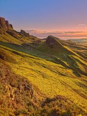 The Quiraing landform below Meall na Suiramach crest with (L-R) The Needle and The Prison rocks, Cnoc a Mh&egrave;irlich and D&ugrave;n M&ograve;r hills. Skye-Scotland-164