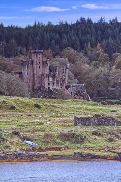 The Caisteal Dh&ugrave;n Bheagain building and estate, seat of Clan MacLeod, on the Loch Dunvegan east side, seen from the local road. Skye-Scotland-147
