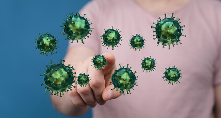A man's hand points toward several virus cells, representing the concepts of disease, health, and a scientific
