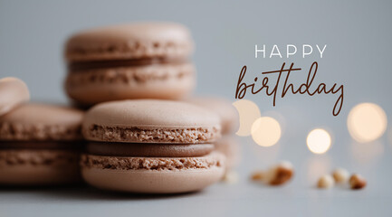 Soft focus pastries accompany script message creating elegant celebratory dessert scene.