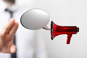 Concept of communication through the megaphone with a speech bubble for announcement, marketing,...