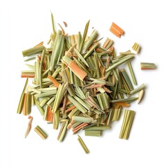 A pile of small pieces of dried lemongrass on a white background