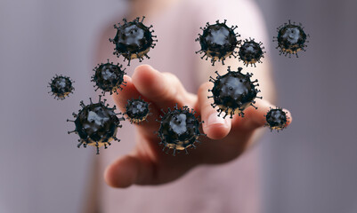 A symbolic depiction of the spread of a virus. Hand reaching to the representation of the infection. Suitable