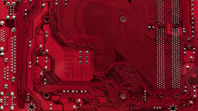 vista macro della parte inferiore rossa di un circuito stampato pcb