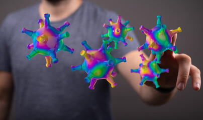 Abstract and conceptual image with person holding 3D virus models. A visual representation of health, disease,