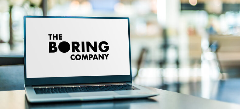 Laptop computer displaying logo of The Boring Company