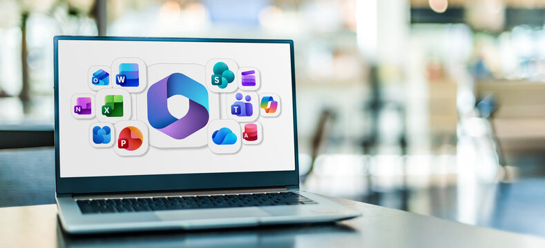 Laptop computer displaying logos of Microsoft 365