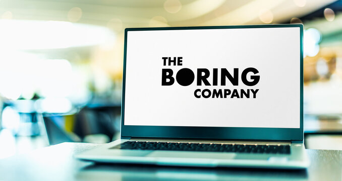 Laptop computer displaying logo of The Boring Company