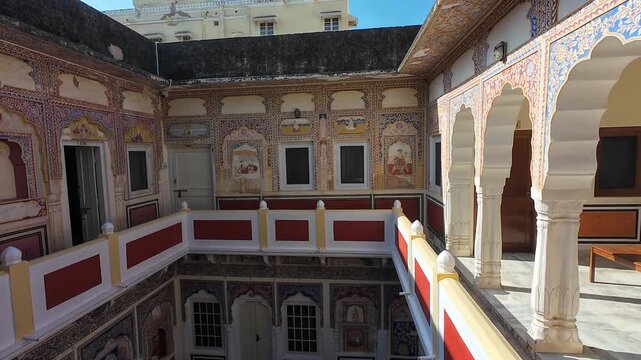 Historic Rajputana Haveli Architecture Showcasing Detailed Hand-Painted Art and Decorative Stone Arches within the Royal Fortress Mandawa Complex