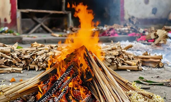 Sacred Fire Burning Brightly on a Wooden Pyre During a Traditional Cremation Ceremony.