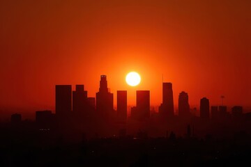 Obraz premium Los Angeles Skyline at Dawn: A Vibrant Silhouette Bathed in Sunrise Hues