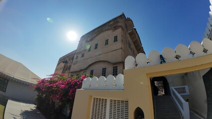 Panoramic View of the Grand Open Courtyard Inside Mandawa Fort Featuring Massive Heritage Walls and Garden Landscaping in Rajasthan