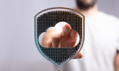 Concept of data security and cloud computing represented. Person pointing towards a cloud with shield. Secure c