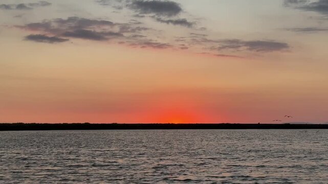 Sunset over the Pacific Ocean in Rio Grande de Tarcoles, Costa Rica