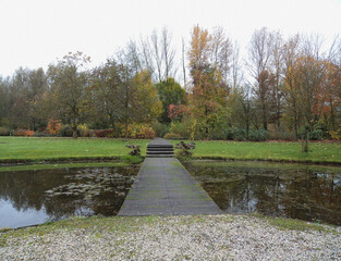 Bridge in the park. Minimalist view. Nature backdrop. Beautiful natural flyer, card design. Nature Template for presentation or product 
