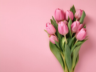 Vibrant pink tulips bouquet on soft pastel background for spring.