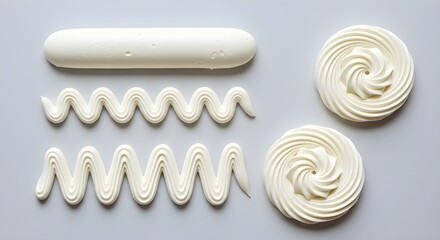 Top View of White Piped Whipped Cream Frosting Swirls and Lines