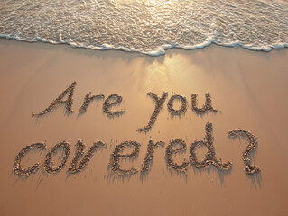 Insurance Inquiry on beach with waves and sunset light.