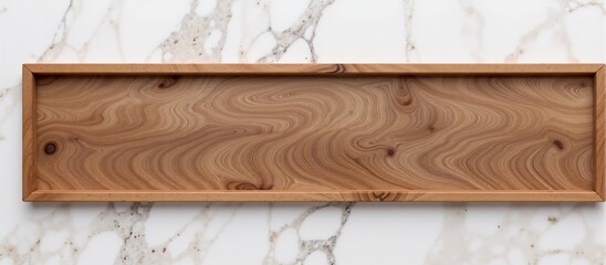 Rectangular wooden tray on a marble countertop with copy space